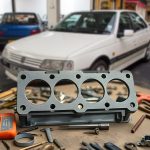 واشر سر سیلندر روی میز کار با پس زمینه پژو 405