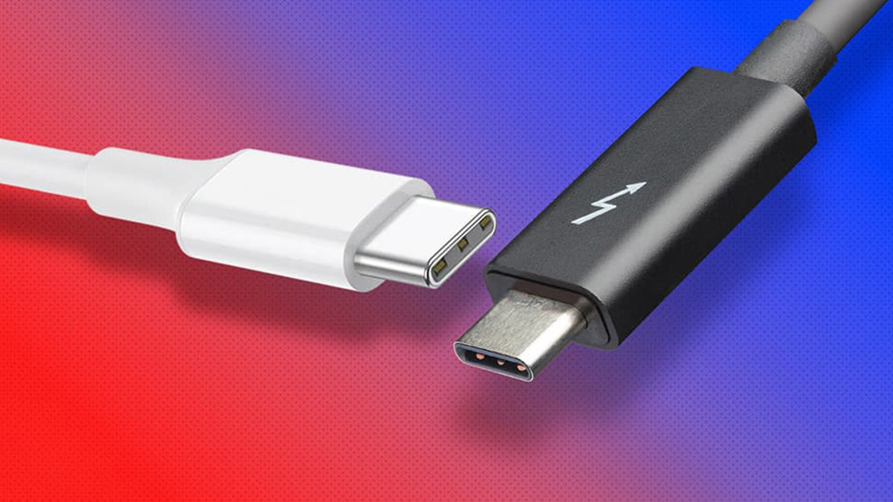 یک کابل تاندربولت مشکی و یک کابل USB-C سفید در پس زمینه ای به رنگ مشکی و آبی