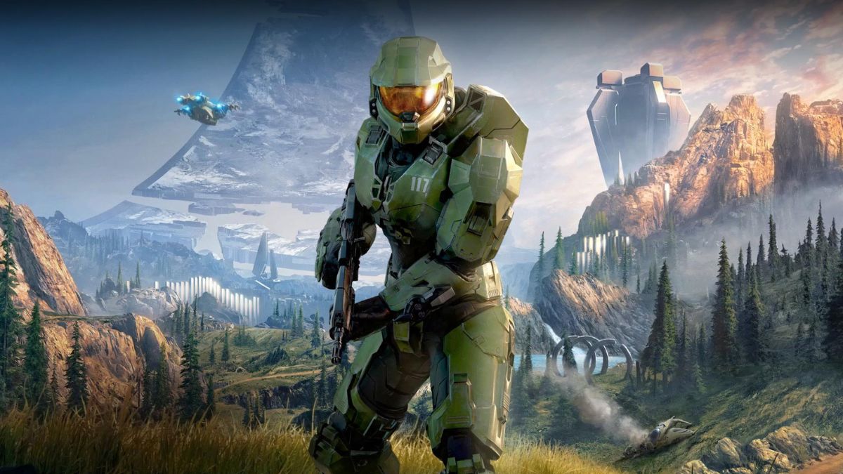 آرت ورک بازی Halo Infinite در حال نمایش مستر چیف با یک تفنگ با منظره طبیعی در پس‌زمینه